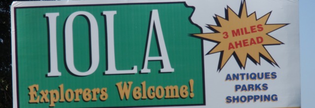 Iola's welcome sign north on hwy 169.