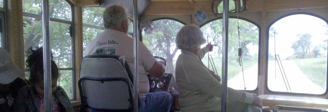 Driver and Hostess guiding an Iola Trolley Tour!